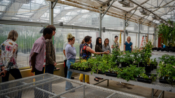 Students at Colorado State University greenhouse on a career tour.